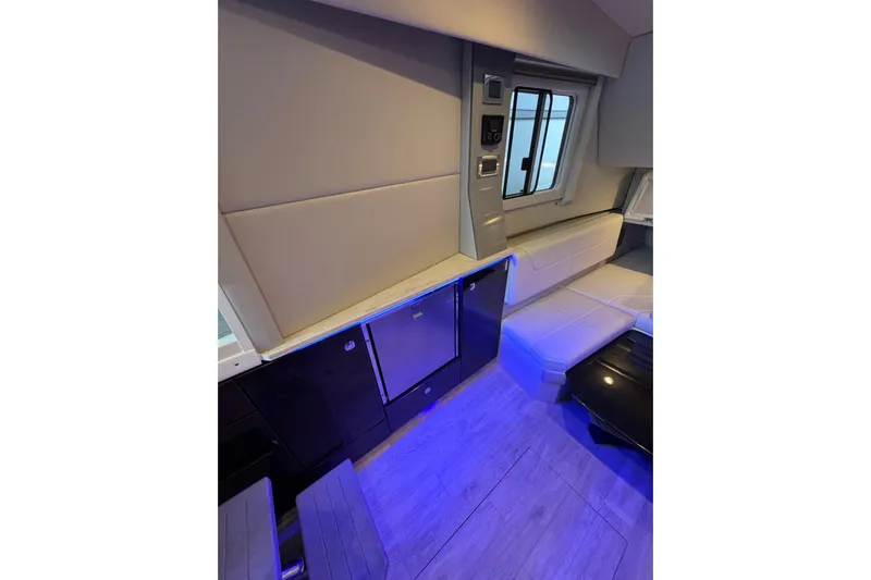 Sea Winds Yacht Photos Pics Interior of 2020 Formula 400 Super Sport Crossover with modern seating and ambient lighting.