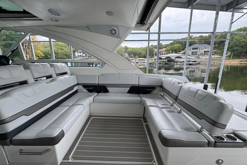 Sea Winds Yacht Photos Pics 2020 Formula 400 Super Sport Crossover interior with luxurious seating and scenic waterfront view.