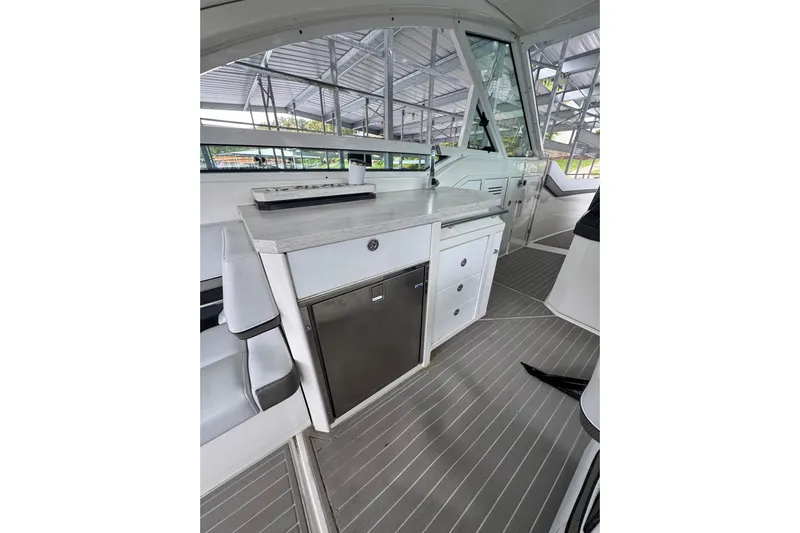 Sea Winds Yacht Photos Pics 2020 Formula 400 Super Sport Crossover interior with sleek cabinetry and modern design.
