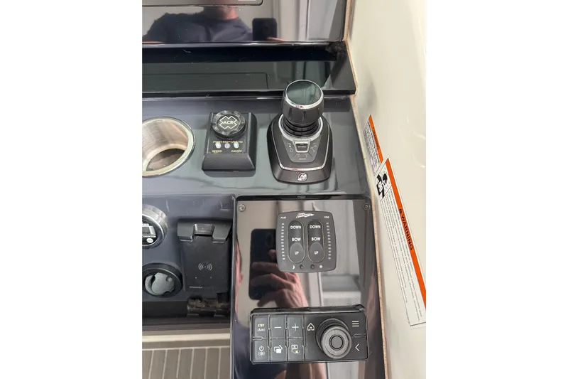 Sea Winds Yacht Photos Pics Control panel of 2020 Formula 400 Super Sport Crossover boat with joystick and buttons.