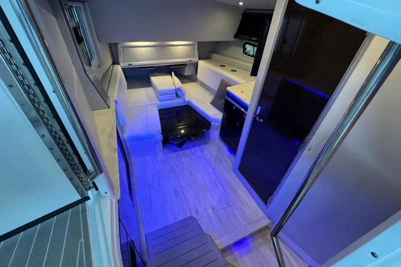 Sea Winds Yacht Photos Pics Interior of 2020 Formula 400 Super Sport Crossover with modern seating and ambient lighting.