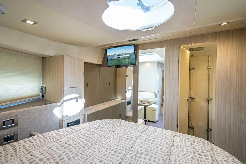 Namaste Yacht Photos Pics Luxurious interior of 2021 Cranchi M44 yacht with modern furnishings and natural light.