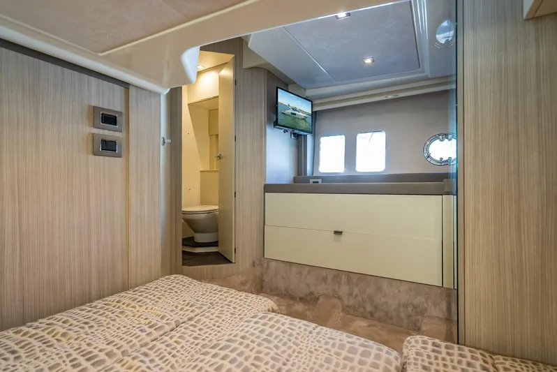 Namaste Yacht Photos Pics Luxurious interior of 2021 Cranchi M44 yacht cabin with modern amenities and elegant design.