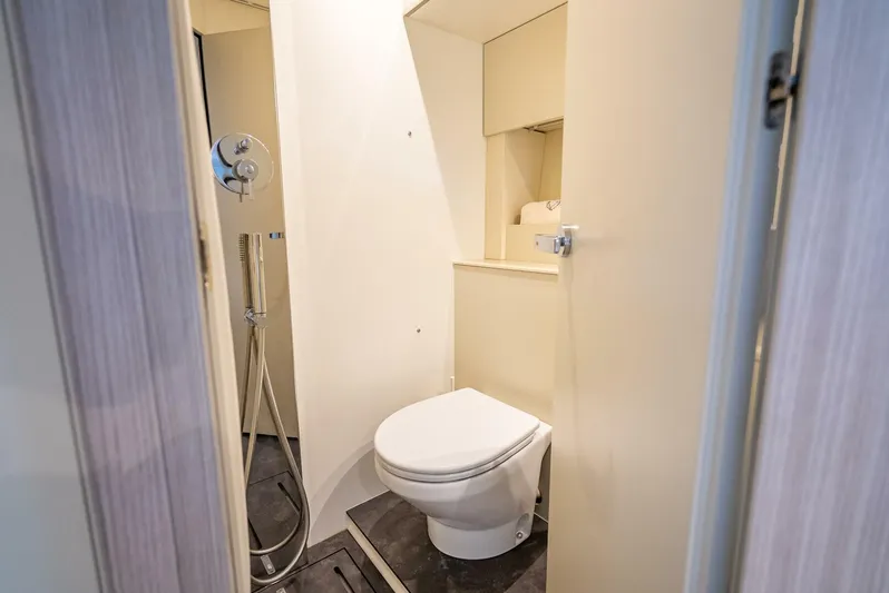 Namaste Yacht Photos Pics 2021 Cranchi M44 yacht bathroom with modern fixtures and compact design.