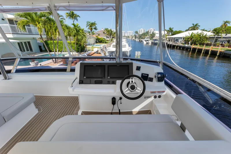  Yacht Photos Pics Catamaran Brokerage Leopard 46 PC Helm Powercat