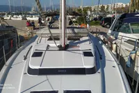 2020 Bavaria C45 sailboat docked at marina with other boats in background.