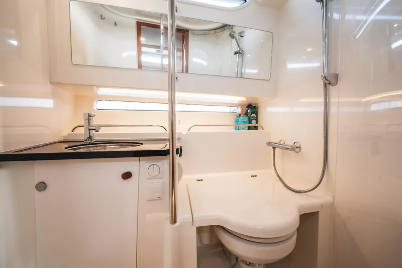 Lady Lindy Yacht Photos Pics Modern bathroom in 2021 Nimbus C-11 boat with sleek fixtures and shower.