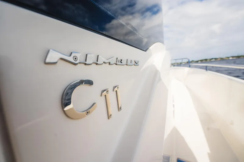 Lady Lindy Yacht Photos Pics Nimbus C-11 boat exterior, showcasing sleek design and branding, 2021 model.