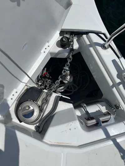 Resfeber Yacht Photos Pics Anchor locker of 2023 Jeanneau Sun Odyssey 380 sailboat with chain and winch.