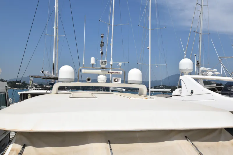 Vesuvio Yacht Photos Pics Luxury yacht Pacific Prestige 170, 2007 model, docked with radar equipment visible.