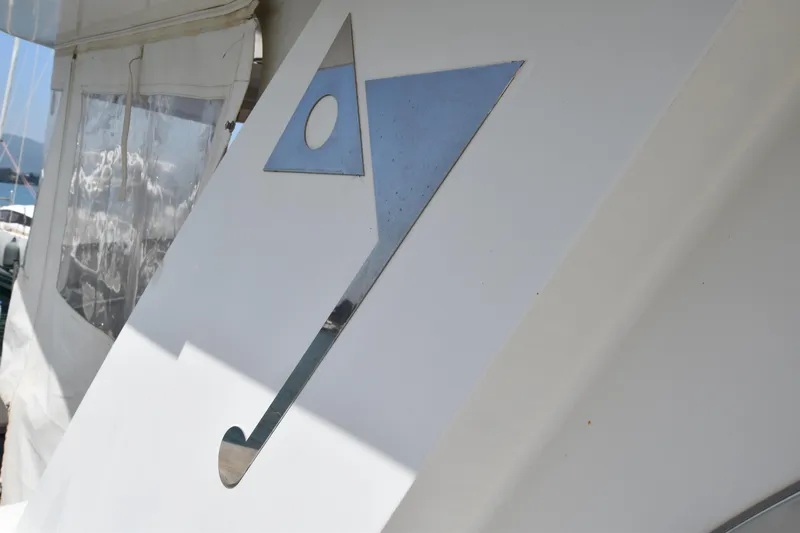 Vesuvio Yacht Photos Pics Pacific Prestige 170 yacht detail, 2007 model, featuring abstract geometric design on white surface.