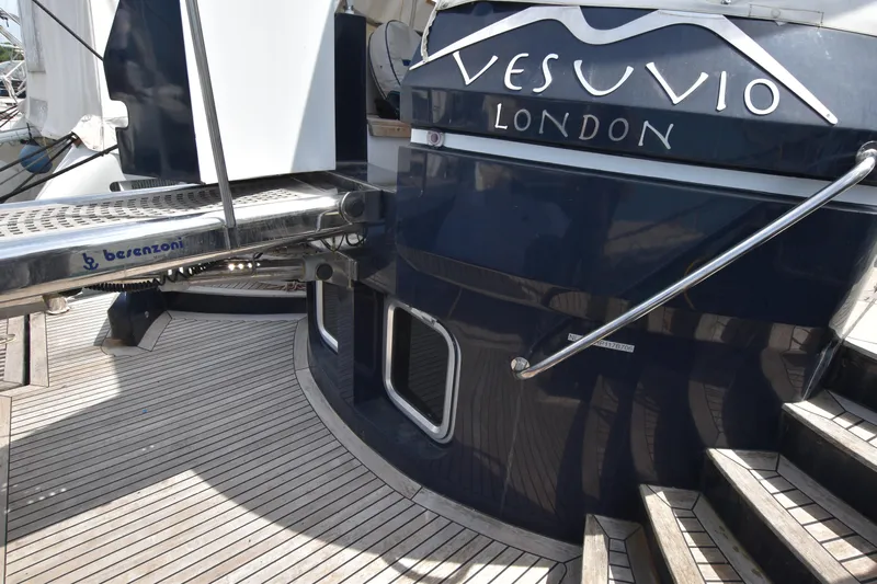 Vesuvio Yacht Photos Pics Luxury yacht "Vesuvio" docked, featuring Pacific Prestige 170, 2007 model, with wooden deck.