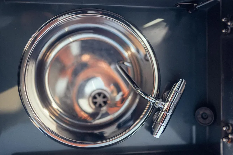 Hummingbird Yacht Photos Pics Stainless steel sink with modern faucet on Fjord 40 Open yacht, 2008 model.