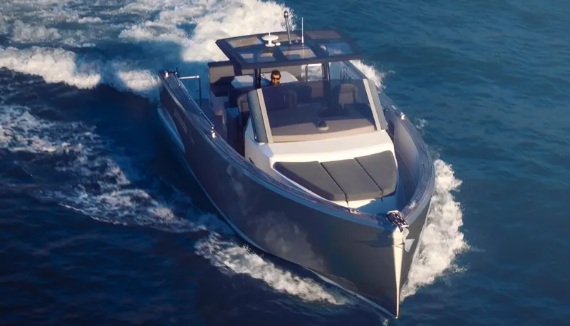 Hummingbird Yacht Photos Pics Luxury 2008 Fjord 40 Open yacht cruising on open water.