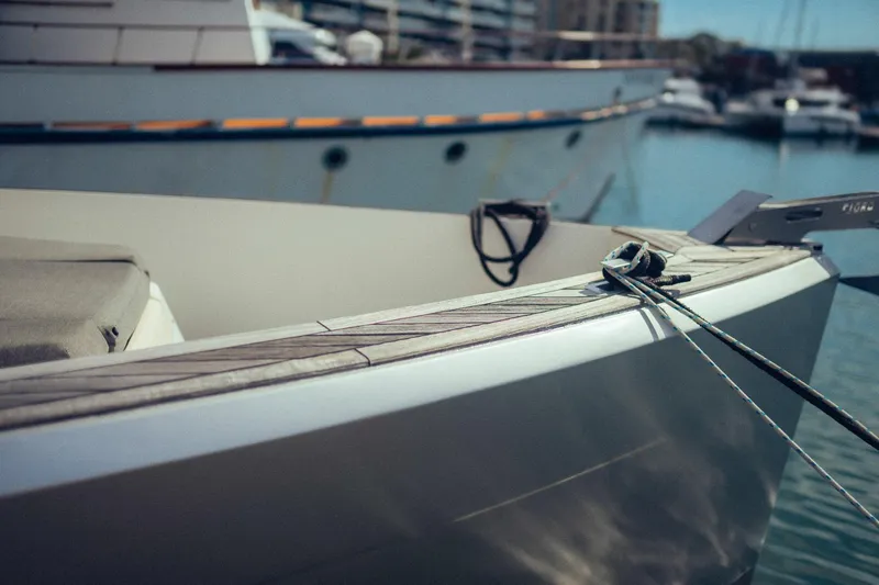 Hummingbird Yacht Photos Pics Fjord 40 Open 2008 yacht docked in marina, showcasing sleek design and mooring lines.