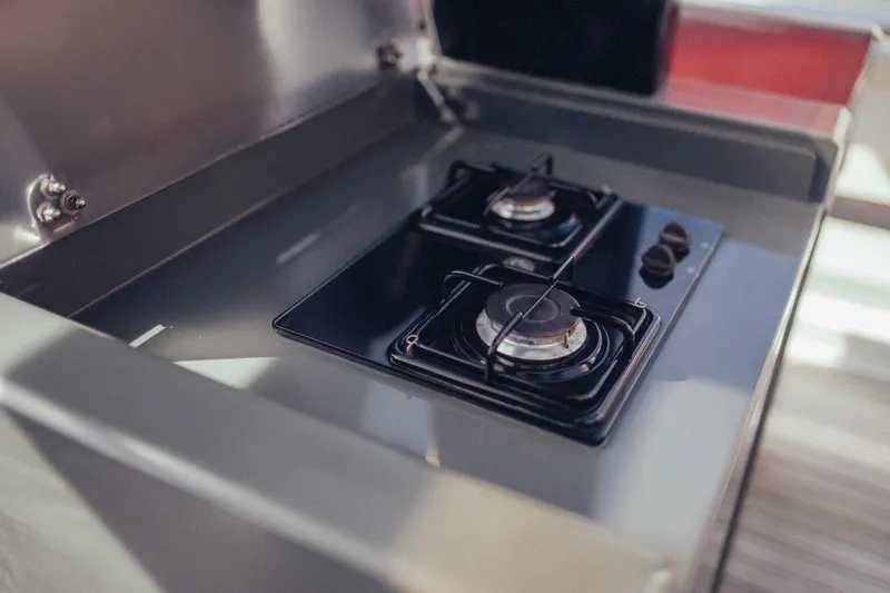 Hummingbird Yacht Photos Pics Stainless steel two-burner stove on a 2008 Fjord 40 Open yacht.