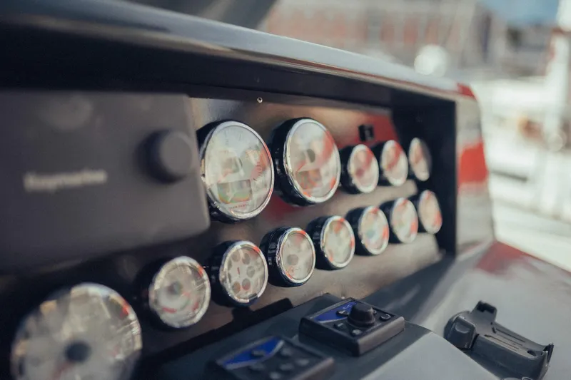 Hummingbird Yacht Photos Pics Dashboard of a 2008 Fjord 40 Open boat with multiple gauges and controls.