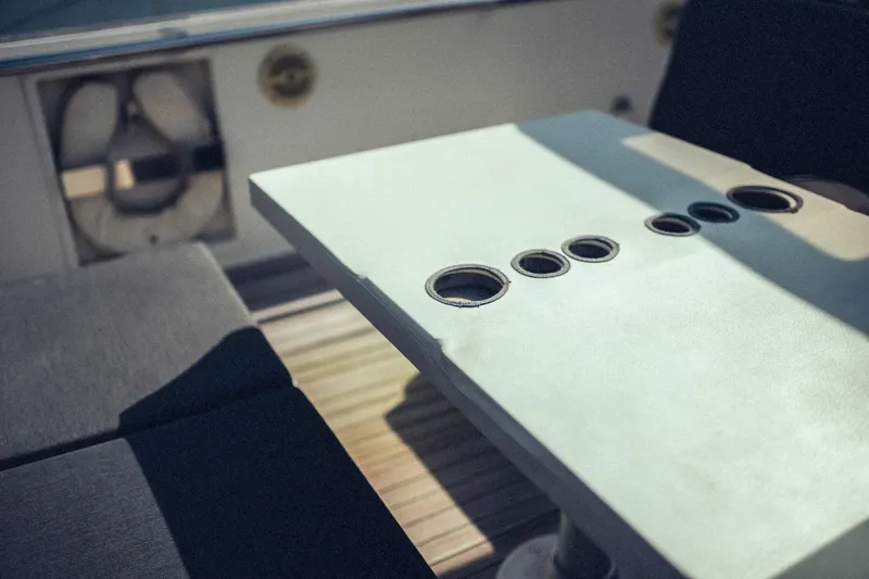 Hummingbird Yacht Photos Pics Modern boat interior with sleek table design, Fjord 40 Open, 2008 model.