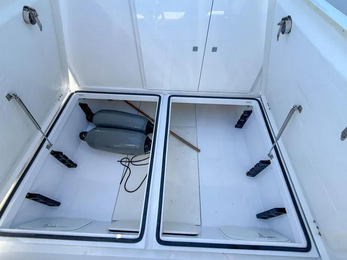 Essi Yacht Photos Pics Open storage compartments on a 2019 Axopar 37 Cabin boat.