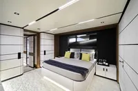 Luxurious bedroom interior on 2021 Wally WHY 200 yacht, featuring modern design and elegant furnishings.