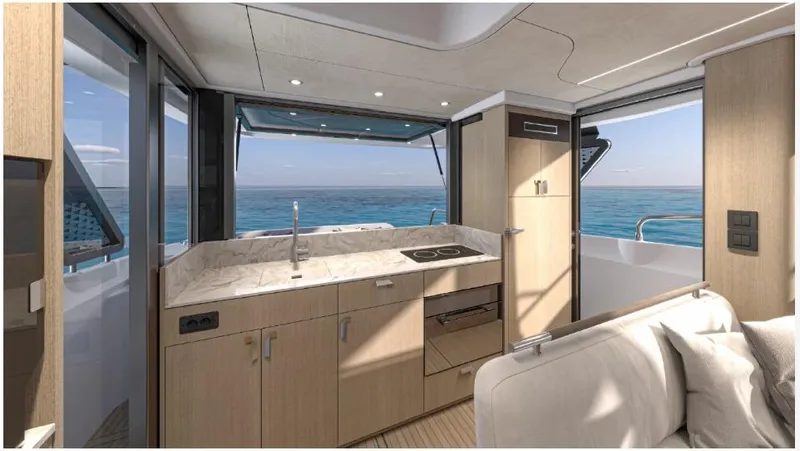  Yacht Photos Pics Modern kitchen interior of 2025 Prestige F4.3 yacht with ocean view.