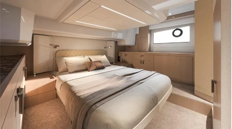  Yacht Photos Pics Luxurious bedroom interior of 2025 Prestige F4.3 yacht with modern design and cozy ambiance.