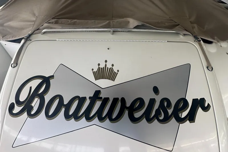  Yacht Photos Pics 2004 Formula 370 SS boat with "Boatweiser" logo and crown design on the stern.