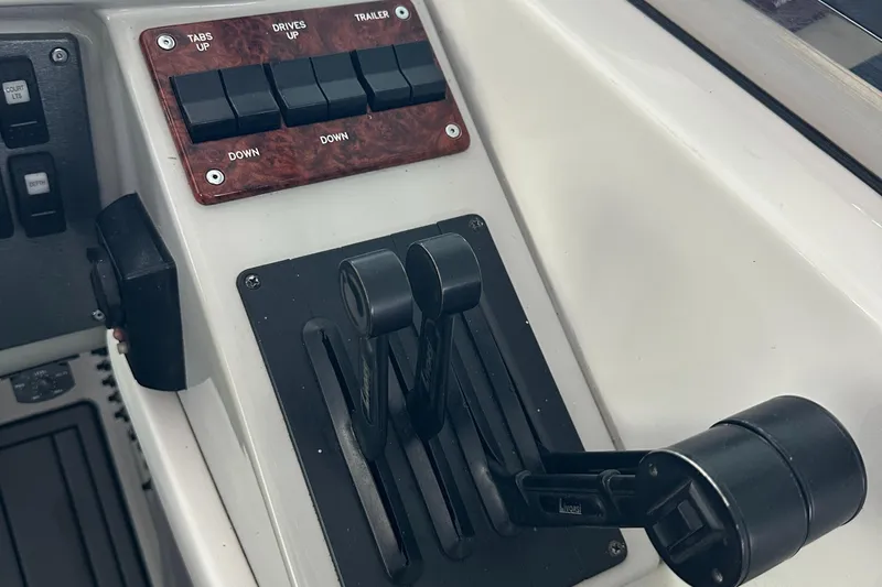  Yacht Photos Pics Control panel of a 2004 Formula 370 SS boat with throttle levers and switches.