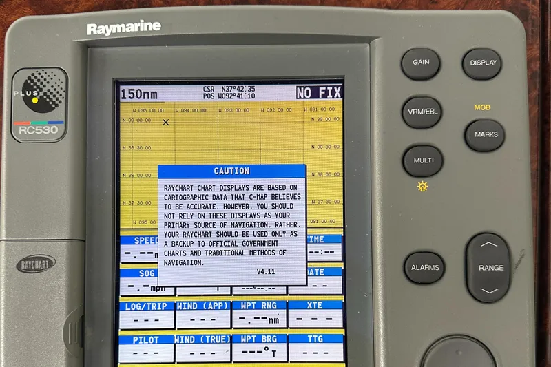  Yacht Photos Pics Raymarine GPS display with caution notice on a 2004 Formula 370 SS boat.