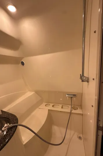  Yacht Photos Pics 2004 Formula 370 SS boat bathroom with shower and modern fixtures.