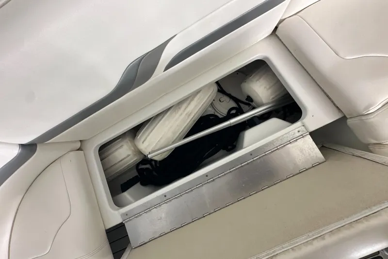  Yacht Photos Pics 2004 Formula 370 SS boat storage compartment with cushions and equipment.