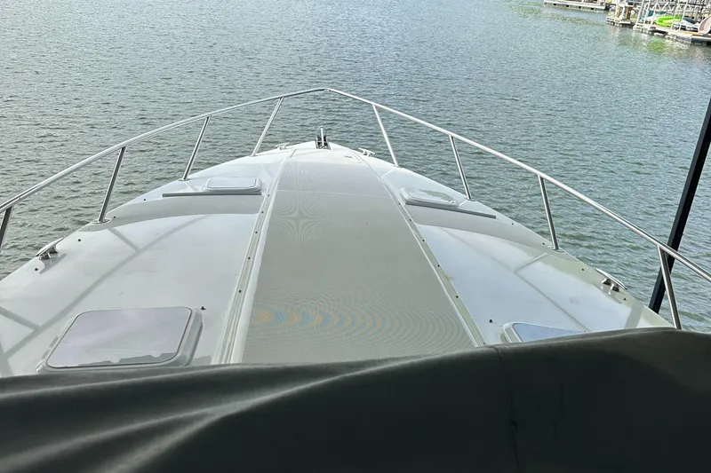  Yacht Photos Pics 2004 Formula 370 SS boat on water, view from bow, railing visible.