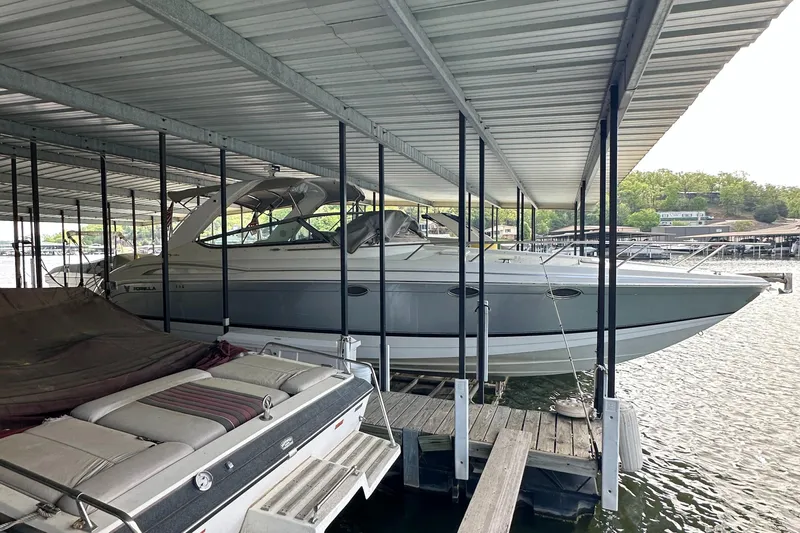  Yacht Photos Pics 2004 Formula 370 SS boat docked under a covered marina.