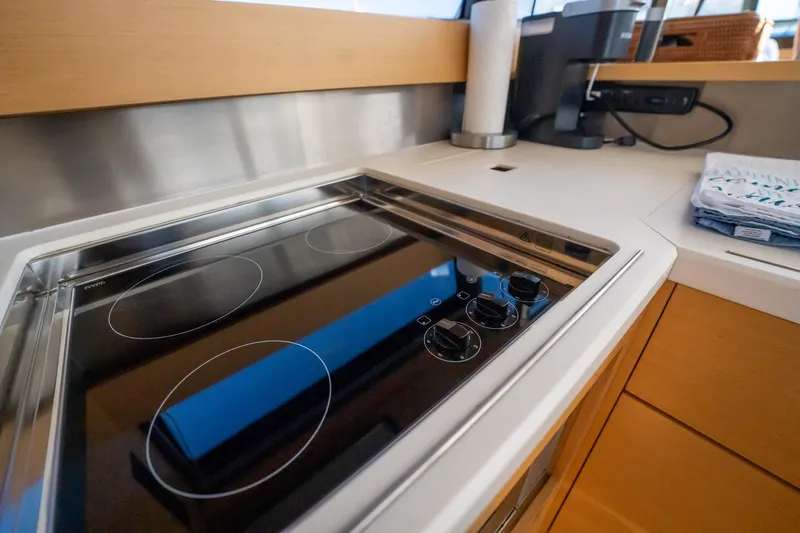 The Best Day Ever Yacht Photos Pics Modern kitchen in 2013 Prestige 500S yacht with sleek electric stovetop.