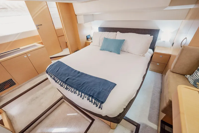 The Best Day Ever Yacht Photos Pics Luxurious bedroom interior of 2013 Prestige 500S yacht with modern furnishings.