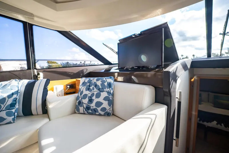 The Best Day Ever Yacht Photos Pics Luxurious interior of 2013 Prestige 500S yacht with plush seating and modern decor.