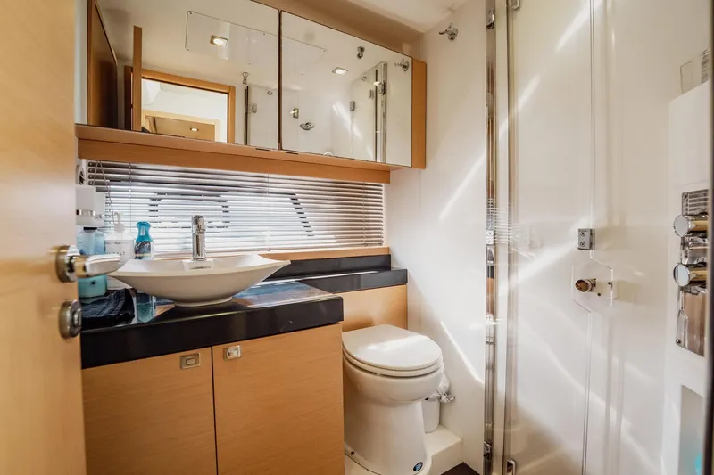 The Best Day Ever Yacht Photos Pics Luxurious bathroom interior of 2013 Prestige 500S yacht, featuring modern fixtures and elegant design.