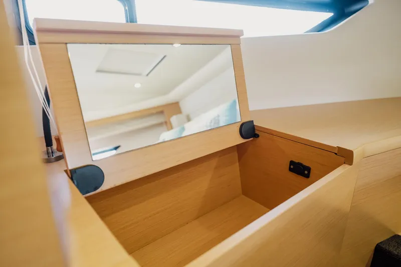 The Best Day Ever Yacht Photos Pics Interior of 2013 Prestige 500S yacht with wooden vanity and mirror.