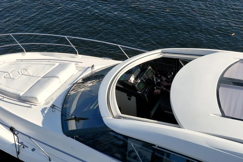 The Best Day Ever Yacht Photos Pics 2013 Prestige 500S yacht on water, featuring sleek design and spacious deck.