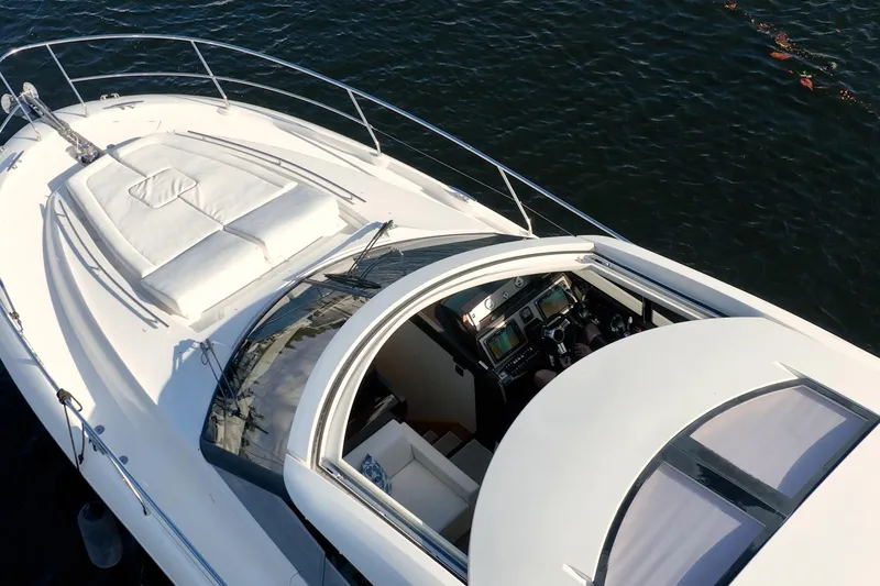 The Best Day Ever Yacht Photos Pics Aerial view of 2013 Prestige 500S yacht with sleek design and spacious deck.