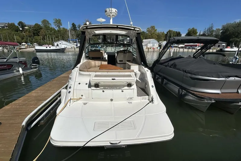  Yacht Photos Pics 2016 Sea Ray 350 Sundancer docked at marina, rear view.