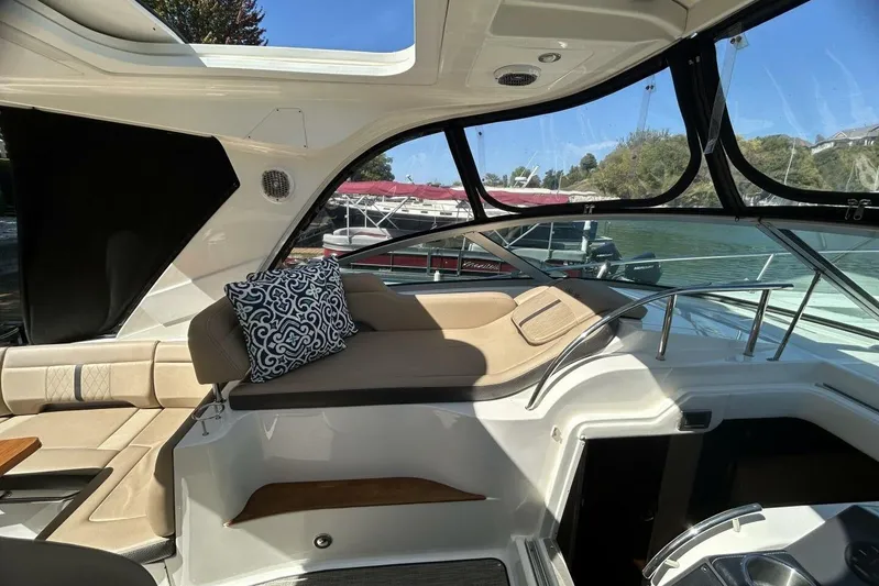  Yacht Photos Pics Interior of 2016 Sea Ray 350 Sundancer yacht with plush seating and scenic view.