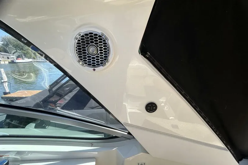  Yacht Photos Pics Interior view of a 2016 Sea Ray 350 Sundancer boat with speaker and window.