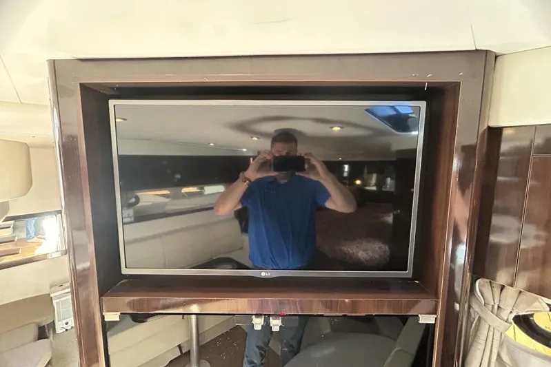  Yacht Photos Pics Interior of 2016 Sea Ray 350 Sundancer with wall-mounted LG TV.