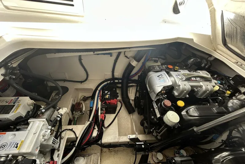  Yacht Photos Pics Engine compartment of a 2016 Sea Ray 350 Sundancer, showcasing detailed mechanical components.