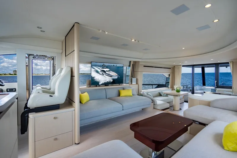 Effortless Yacht Photos Pics Luxurious interior of 2023 Azimut Fly 68 yacht with ocean view and modern furnishings.