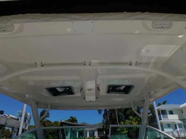  Yacht Photos Pics Boston Whaler 320 Vantage 2016 boat roof with hatches and support structure.