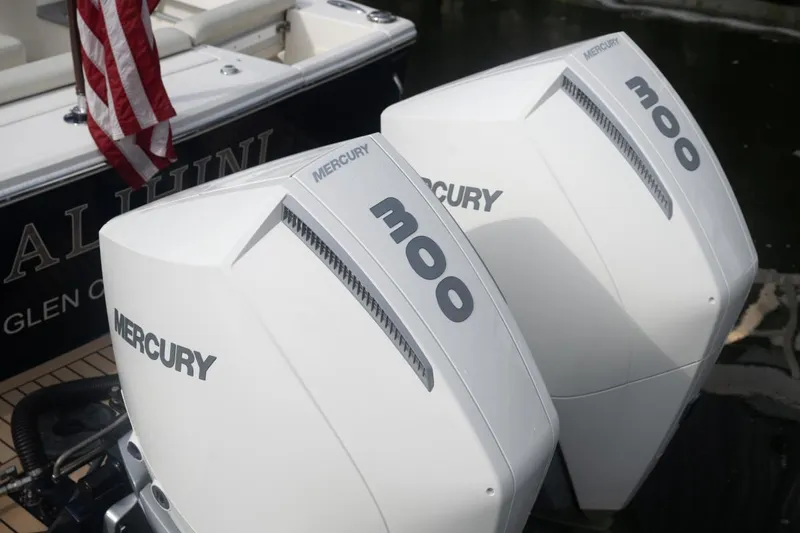 Malihini Yacht Photos Pics Twin Mercury 300 outboard engines on a 2019 Hunt Yachts 32 Center Console.