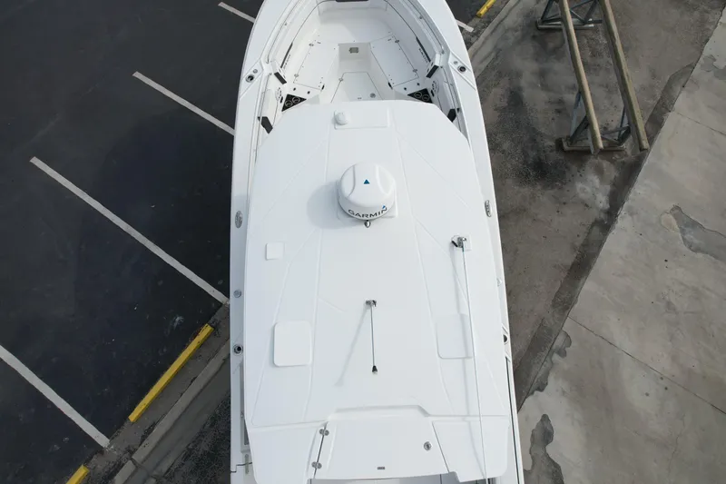  Yacht Photos Pics Aerial view of 2023 Blackfin 332 CC boat docked, showcasing sleek design and spacious deck.