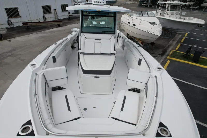  Yacht Photos Pics 2023 Blackfin 332 CC boat with spacious seating and modern design.